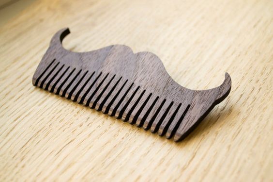 Laser Cut Mustache Shaped Comb Free Vector